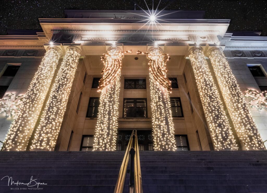 Christmas events in Prescott start with the Courthouse Lighting. Prescott, Arizona Courthouse decorated in holiday lights.